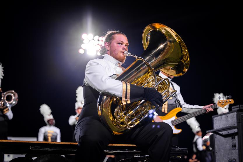Students perform on football field
